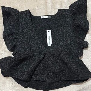 Black and White Flutter Sleeve Peplum Blouse